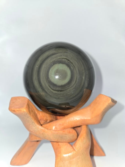 Natural Rainbow Obsidian Sphere with Hand-Carved Wooden Stand